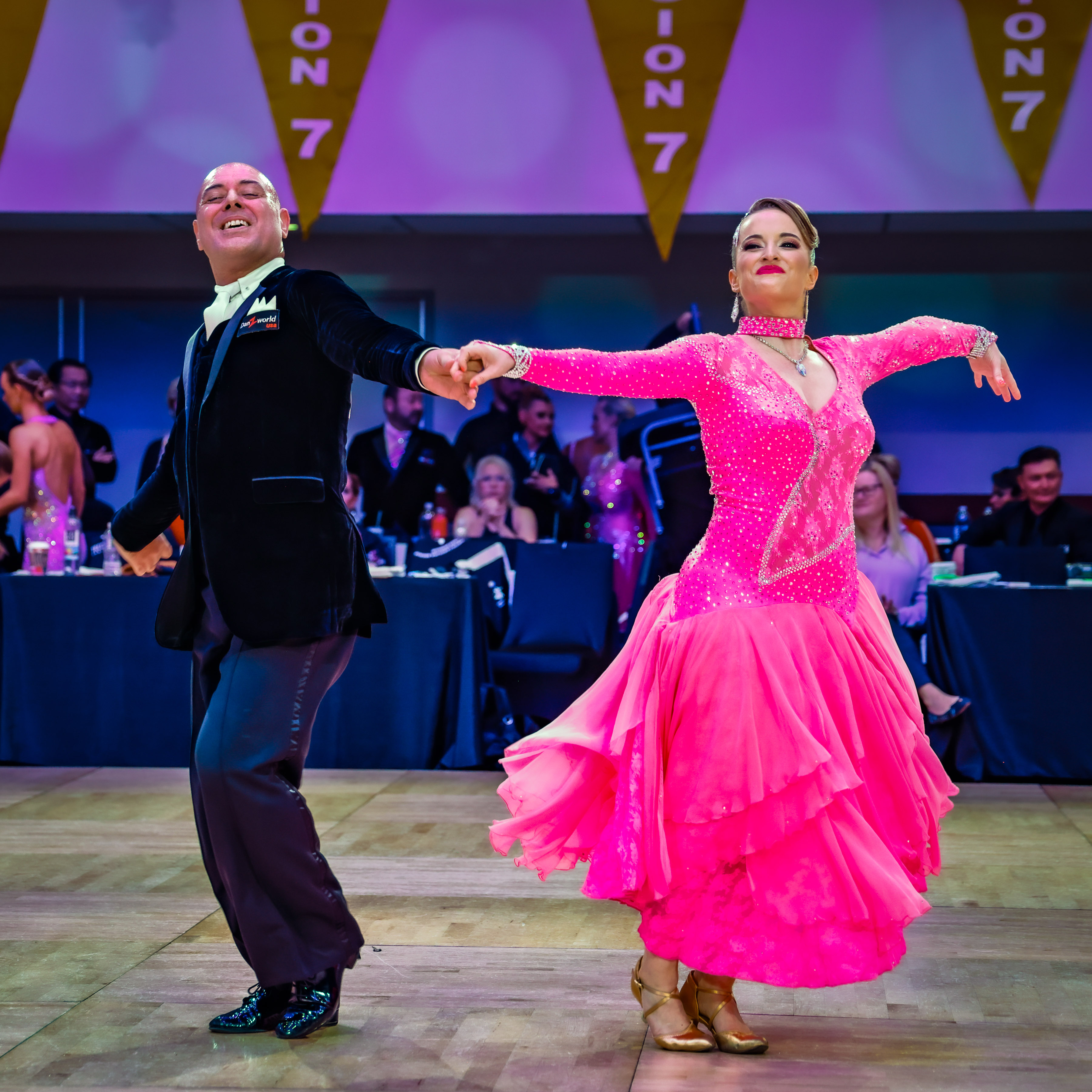 Angel and Madeline performing with dynamic posture and partnership connection